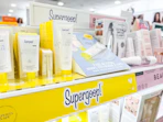 Supergoop products on a shelf