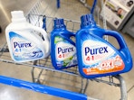 one white Purex bottle and two blue Purex bottles