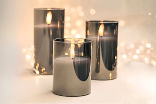 Lifestyle image of the HIDAWN Flameless Candles 3-piece set
