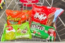 reese's, kit kat, hershey's, and M&Ms Christmas candy in a cart