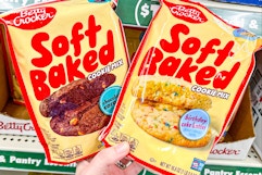 hand holding betty crocker soft baked cookie mixes