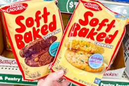 hand holding betty crocker soft baked cookie mixes
