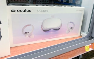 An Oculus Quest 2 displayed in a case in Walmart's electronics department.