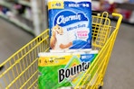charmin and bounty stacked in yellow shopping cart