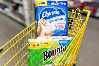 charmin and bounty stacked in yellow shopping cart