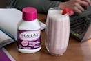 Miralax Laxative Powders next to drink