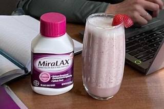 Miralax Laxative Powders next to drink