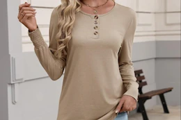 a woman wearing a long sleeve top