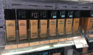 A row of Maybelline Fit Me Foundation on a store shelf.