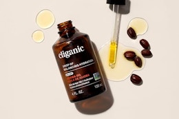 Cliganic Jojoba Oil Non-GMO, Bulk 16oz on a beige background.