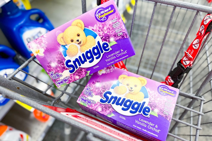 2 boxes of snuggle dryer sheets in a cart