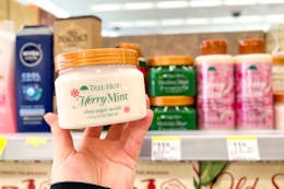 hand holding body scrub