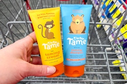 t is for tame shampoo and taming cream in a cart