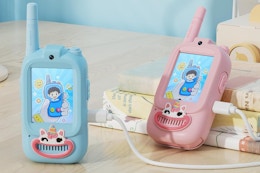 video walkie talkie being charged on table