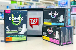 kotex pads in front of a walgreens basket