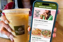 someone holding a panera cup and a phone showing the unlimited sip club offer