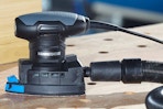 a detail sander on a table