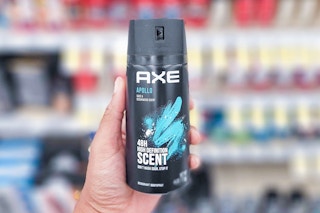 hand holding axe body spray