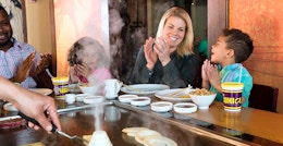family at benihana hibachi table with chef preparing food