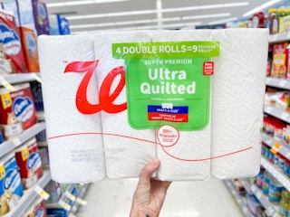 hand holding paper towels