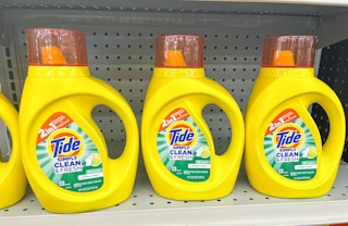 three bottles of Tide Simply liquid laundry detergents on shelf