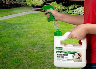 outdoor insect spray being sprayed outside