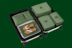 a suitcase with green packing cubes 