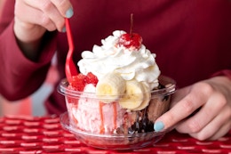 someone eating a banana split from brusters