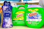 large gain and downy laundry products on a shelf