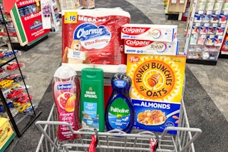 charmin toilet paper, colgate toothpaste, palmolive dish soap, honey bunches of oats cereal, softsoap and irish spring in a cart