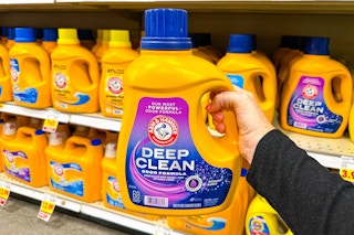 hand holding a bottle of arm hammer deep clean detergent