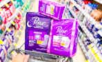 poise products in a walgreens shopping cart