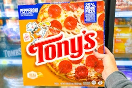 hand holding tonys pizza
