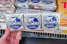 hand holding a pack of klondike bars
