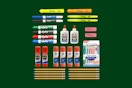 school supplies on a green background