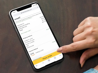 person checking out on woot mobile site with phone