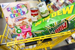 groceries in a yellow shopping cart