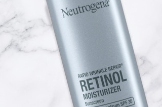 A bottle of Neutrogena retinol sunscreen moisturizer