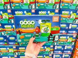 hand holding a box of gogo squeez halloween pouches