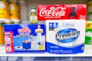 mr. clean, coca-cola, herdez, true living on dollar general store shelf