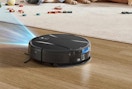 a robot vacuum on hardwood floors