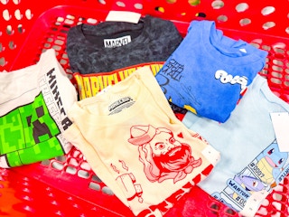 kids graphic tees sitting in a target cart