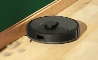 a robot vacuum and mop on hardwood floors