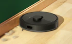 a robot vacuum and mop on hardwood floors