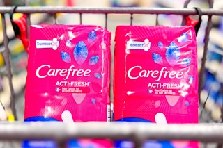 two packs of carefree liners in a shopping cart
