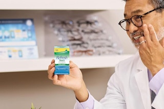 man holding Refresh Tears 2-Pack