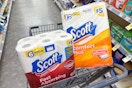 scott paper towels and toilet paper in a cart
