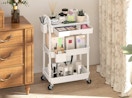 a rolling cart with makeup in a room
