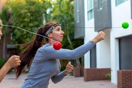 family playing a reflex ball game
