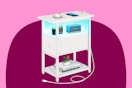 End table with a fabric drawer that opens on the narrow end, plus a charging station with a cord and an LED shelf light.